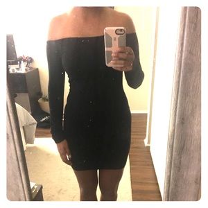 Off the shoulder black cocktail dress